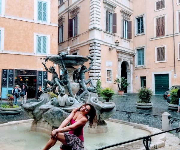 Sitting in Rome by fountain